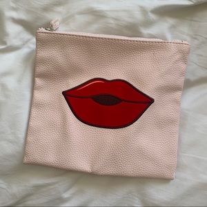 NUDESTIX makeup bag